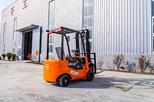 Forklift operator in compact warehouse.